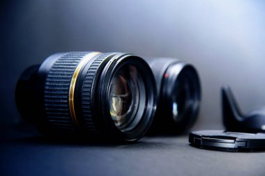 Professional photography lens on black, isolated