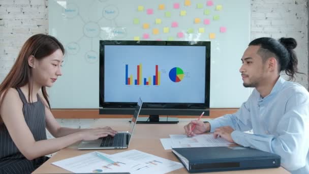 Two Young Smart Asian Coworkers Brainstorming Office Female Colleague Presents — Stock Video