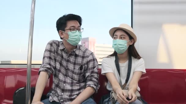 Young Asian Couple Tourist Face Mask Sitting Passenger Cabin Sky — Stock Video