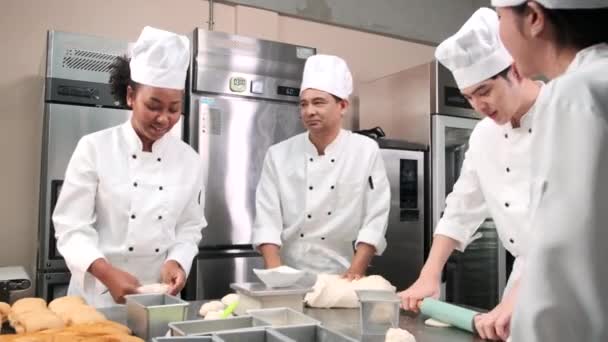 Multiracial Professional Gourmet Team Four Chefs White Cook Uniforms Aprons — Stock Video