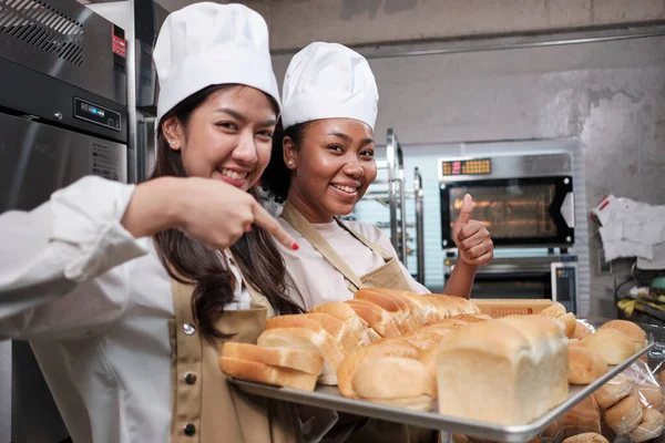 Portrait Two Young Female Chefs Cooking Uniform Looking Camera Cheerful —  Fotos de Stock
