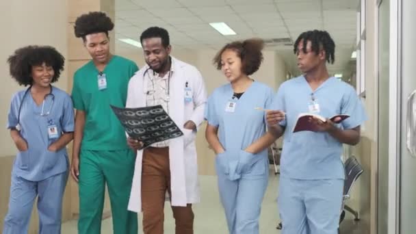 Group Practitioners Professional African American Male Doctor Young Medical Students — 비디오