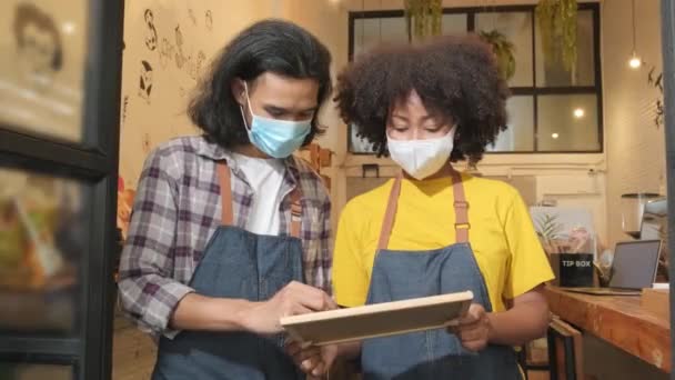 Two Young Startup Barista Partners Face Masks Stand Casual Cafe — Stockvideo
