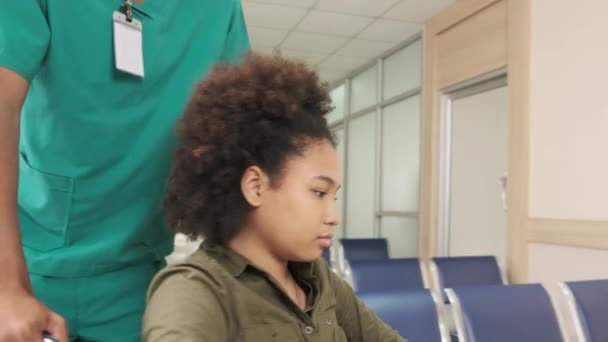Young African American Female Doctor Stethoscope Uniform Checks Injury Patient — Stok video