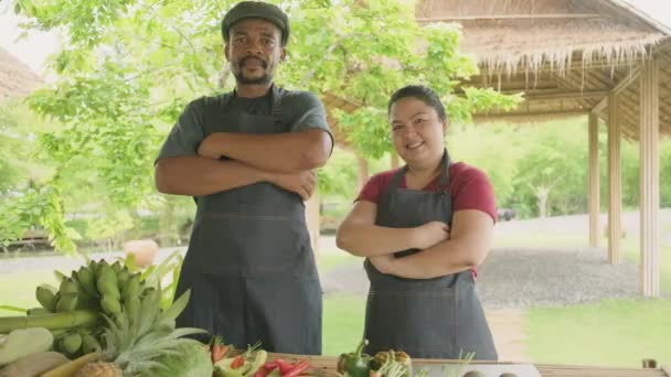 Happy Diverse Farmer Couple Black Asian Husbandry Apron Selling Natural — стоковое видео