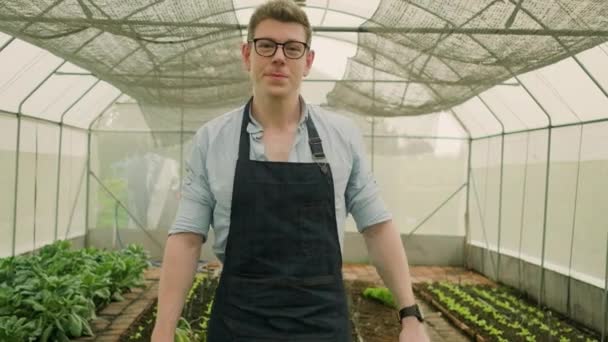 One Caucasian Male Farmer Eyeglasses Funny Teases Spraying Water Foggy — Stock video