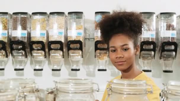 Young African American Woman Choosing Shopping Organic Products Refill Store — Vídeo de Stock