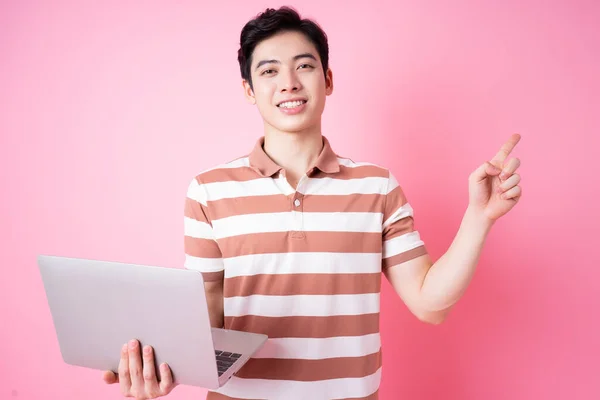 Portrait Young Asian Man Using Laptop Pink Background — Stock Fotó