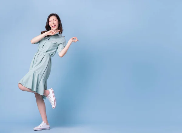 Full Length Image Young Asian Woman Wearing Dress Blue Background — Foto Stock