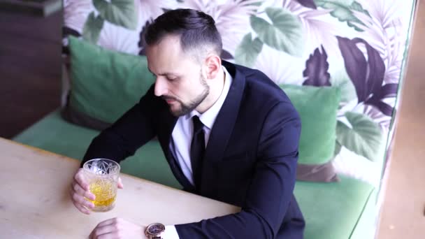 Young Man Beard Dressed Business Suit Tie Sits Table Restaurant — Stockvideo