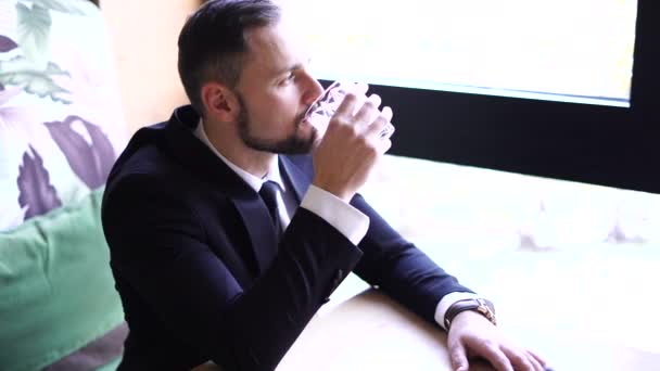 Young Man Beard Dressed Business Suit Tie Sits Table Restaurant — Stock Video