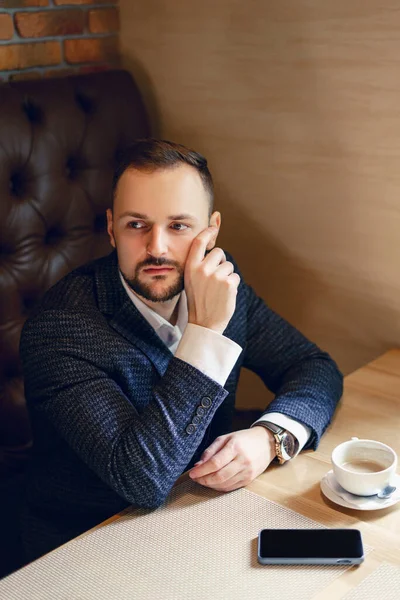 Young Man Neat Beard Dressed Business Suit Smartphone Cup Coffee — Photo