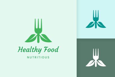 Çatal ve yaprak şekilli sağlıklı gıda logosu