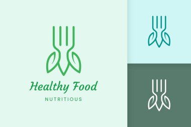 Çatal ve yaprak şekilli sağlıklı gıda logosu