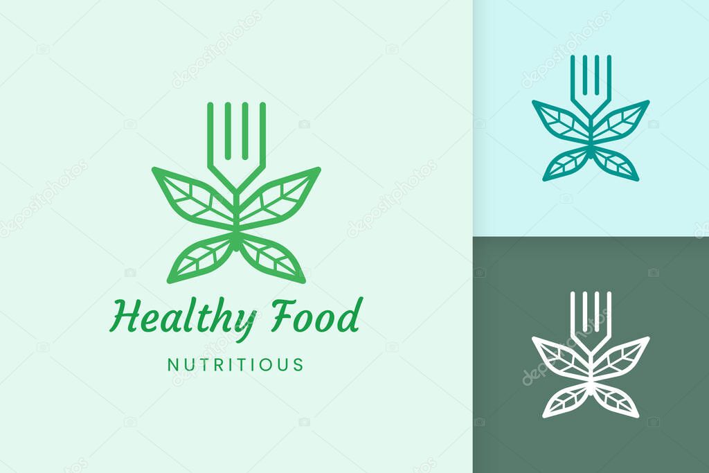 healthy food logo with fork and leaf shape