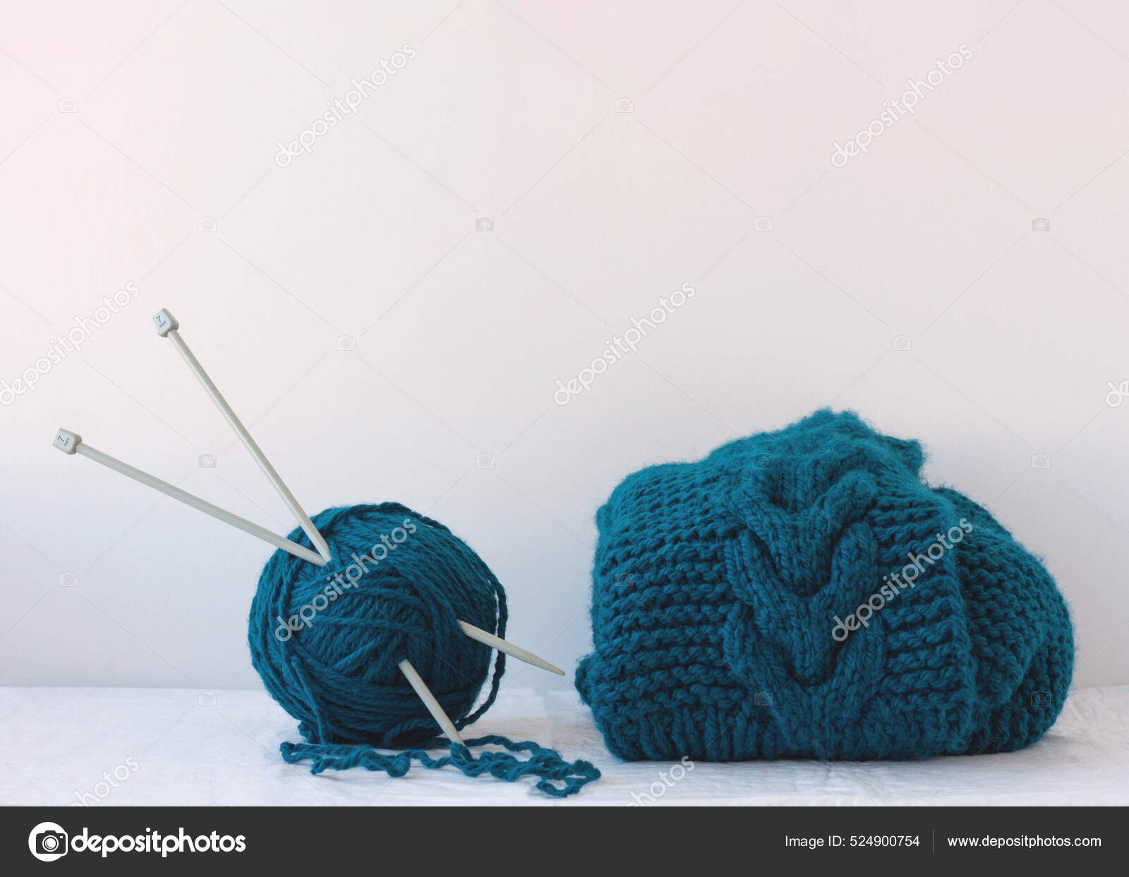 Large Knitting Needles Stuck Large Ball Blue Yarn Next Product Stock Photo  by ©Serebrova 524900754