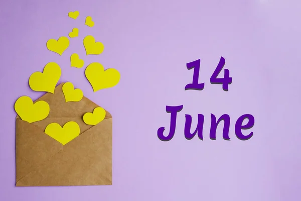 Brown Envelope Yellow Hearts Lilac Background Inscription June Holiday Concept — Stock Photo, Image