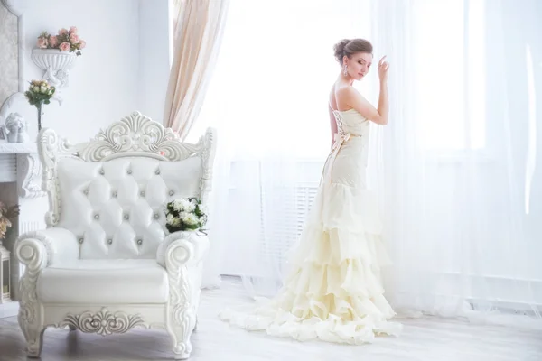 Young bride near curtains. — Stock Photo, Image