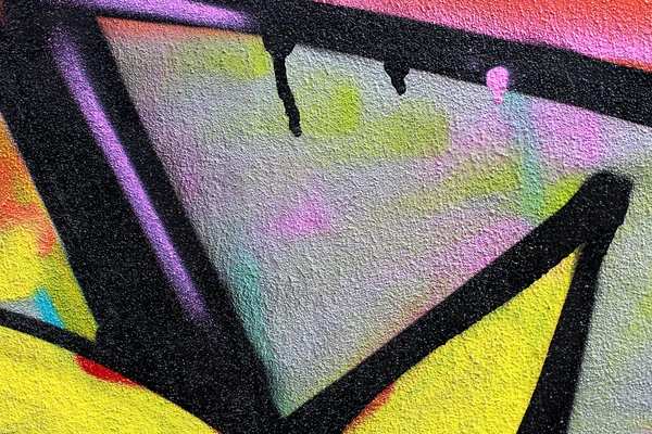 Graffiti em uma parede fundo criativo abstrato — Fotografia de Stock