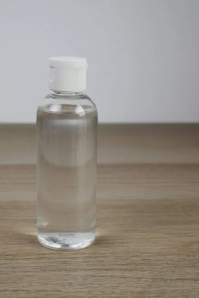 Белая Бутылка Прозрачной Жидкостью Белом Фоне Дезинфицирующие Средства — стоковое фото