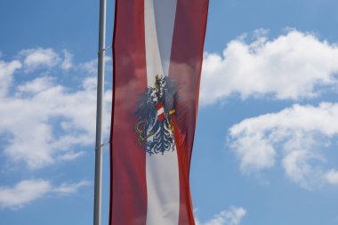 Flag of Austria against the sky.