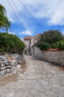 Beautiful old streets in Croatia. Architecture of southern Europe. Old sights and houses.