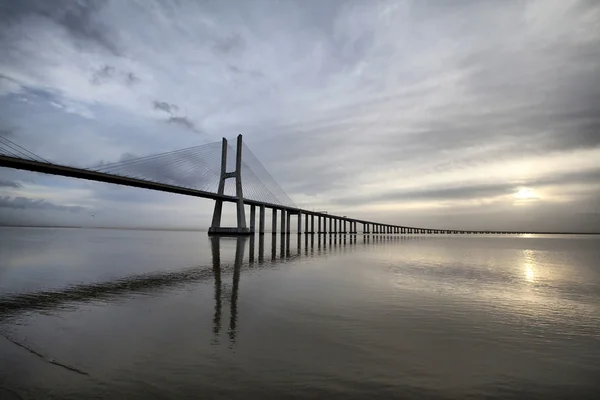 The Vasco da Gama Bridge is a famous landmark in Lisbon — Stock Photo, Image