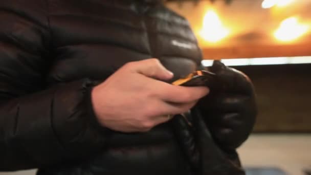 Man uses telephone in hands train station mobile application public transport — Stock Video