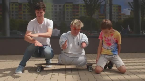 A happy person with a disability with dancing friends. Good mental health people — Stock Video