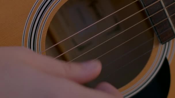 Close-up of musician fingers playing acoustic guitar. Find creative inspiration. — Stock Video