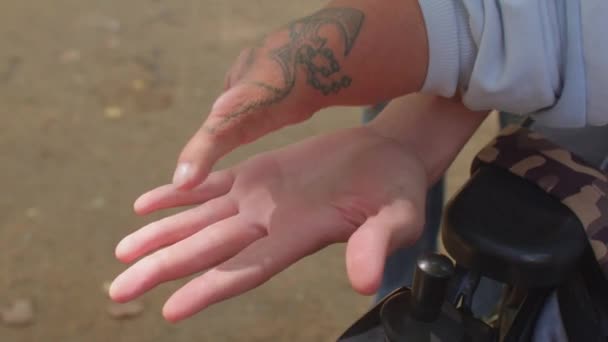Hands of lovers close up. Hand of a disabled person is gently touches. — Video Stock