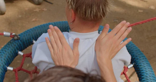 Social worker doing massage to disabled person. Congenital amputations. Close up — Stock Photo, Image