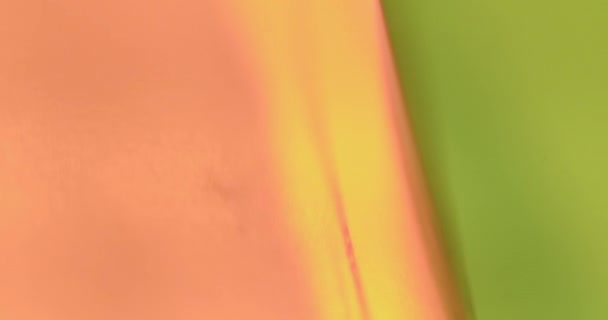 Schütteln Bewegungsrand in Bokeh Farbe orange und grün. Ein Hauch von Rot. — Stockvideo