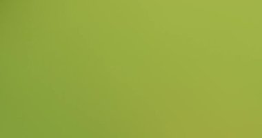 Keskin hareketli renk bokeh. Yeşil, pembe hareket dokusunu değiştiriyor.