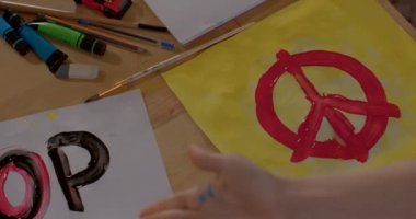 Posters are handmade by children in support of peace. Dove and olive branch,