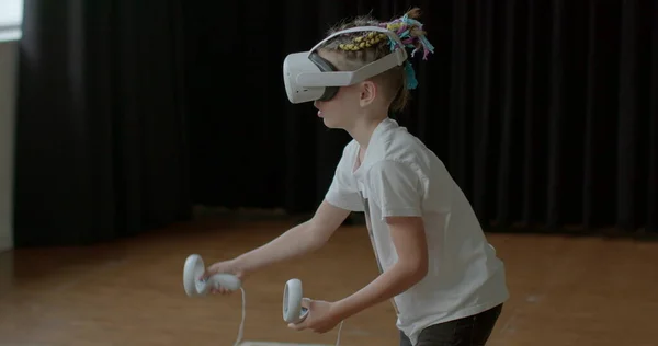 Schoolboy uses virtual reality at school. VR headset complete with a unique student-friendly interface. New concept in educational technology. The Future of Education.