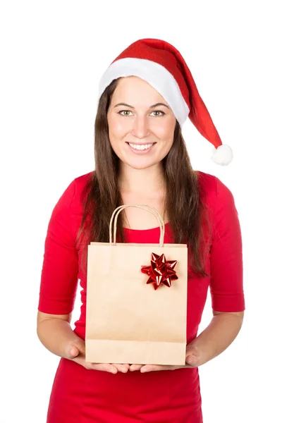 Jolie femme brune en tenue de Noël tenant présent Images De Stock Libres De Droits