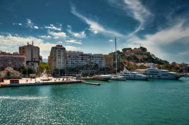 Port of the city of Denia, province of Alicante, Spain. clipart