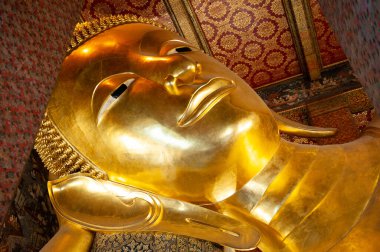 Tayland 'ın Bangkok şehrinde yaslanan Buda