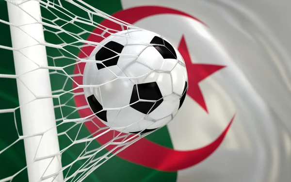 Algérie agitant drapeau et ballon de football dans le filet de but — Photo