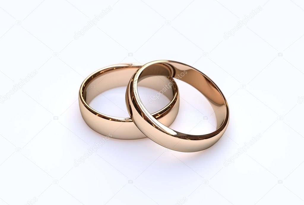 Couple of gold wedding rings on white background — Stock Photo © Barbra