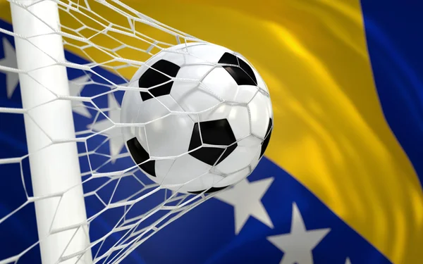 Bosna-Hersek bayrağı ve futbol topu gol net sallayarak