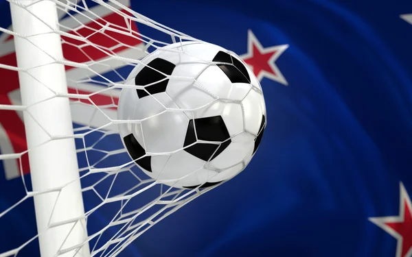 New Zealand waving flag and soccer ball in goal net — Stock Photo, Image
