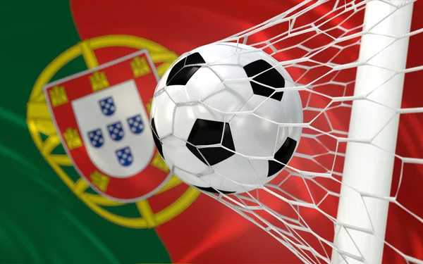 Portugal waving flag and soccer ball in goal net — Stock Photo, Image