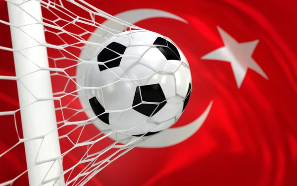 Turkey waving flag and soccer ball in goal net — Stock Photo, Image