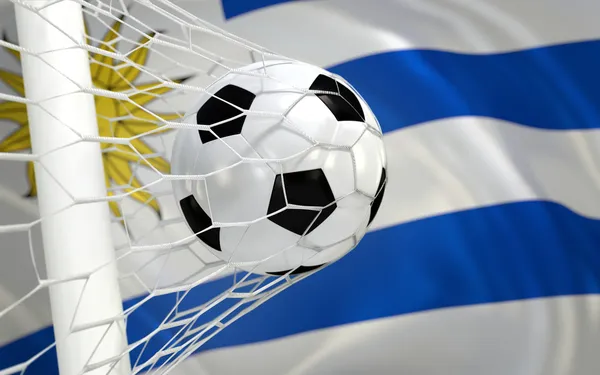 Uruguay waving flag and soccer ball in goal net — Stock Photo, Image
