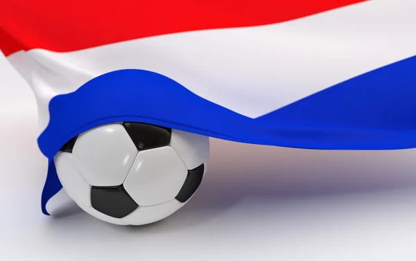 Флаг Нидерландов с футбольным мячом — стоковое фото