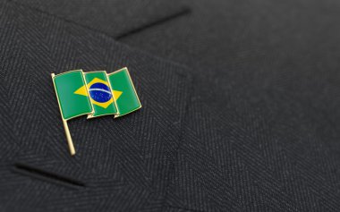 Brazil flag lapel pin on the collar of a business suit clipart