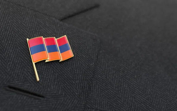 Armenia flag lapel pin on the collar of a business suit — Stock Photo, Image