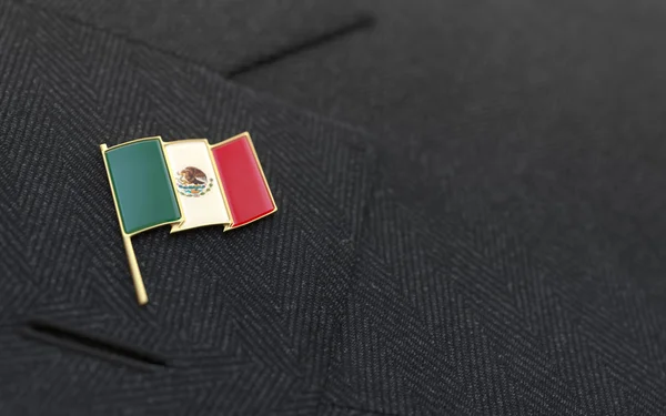 Mexican flag lapel pin on the collar of a business suit — Stock Photo, Image